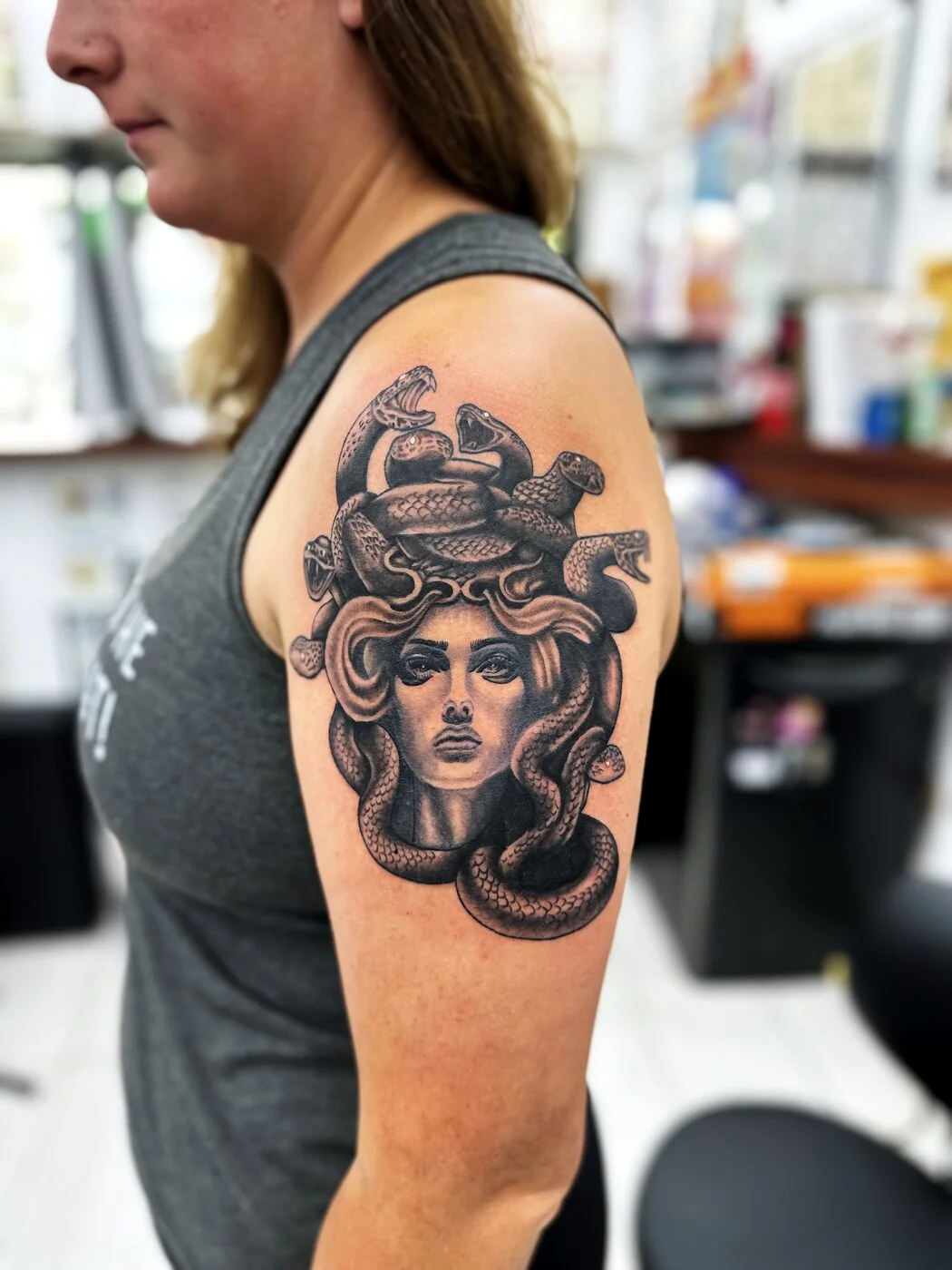 Black & Grey Medusa with snakes tattoo on shoulder by 2bit (Chris Curren) at Lost at Sea Tattoo, Chinatown, Honolulu