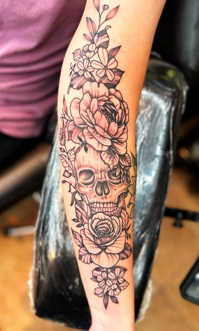 Black & Grey skull with peony rose and floral tattoo on forearm by 2bit (Chris Curren) at Lost at Sea Tattoo, Chinatown, Honolulu