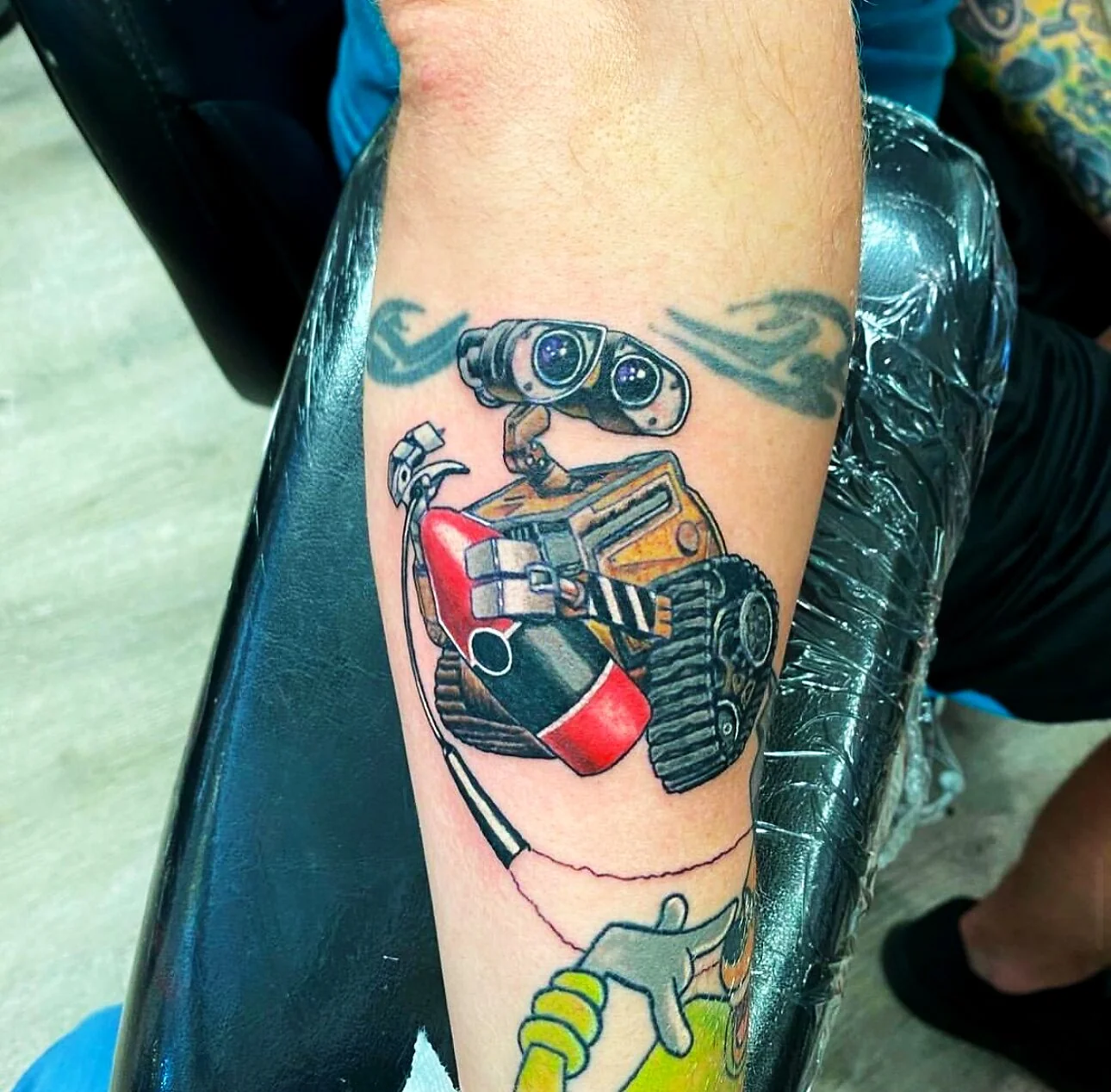 Color Realism Wall-E robot character tattoo on calf by 2bit (Chris Curren) at Lost at Sea Tattoo, Chinatown, Honolulu
